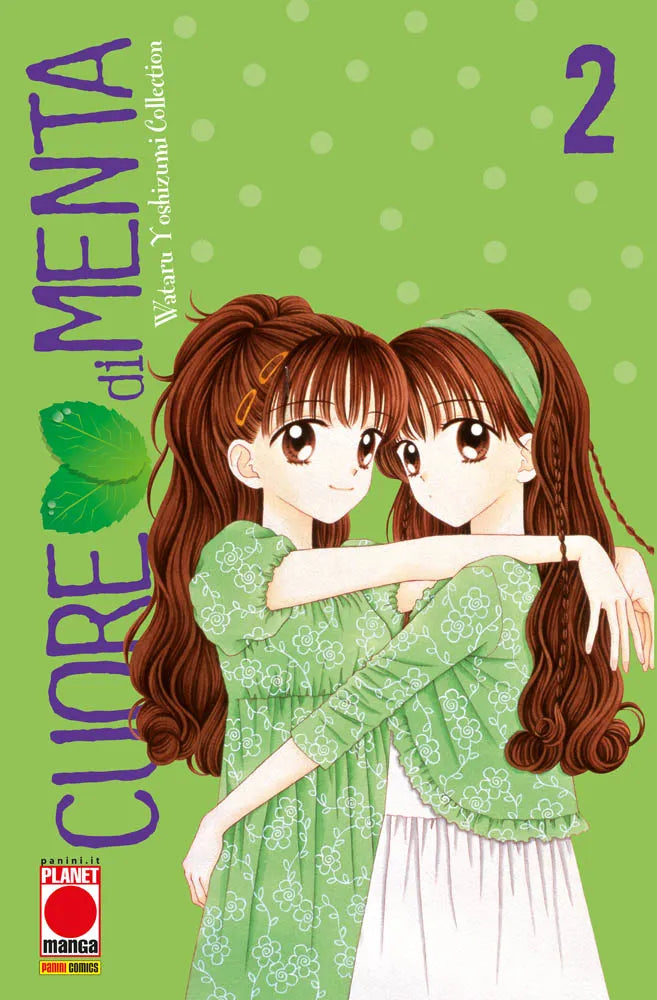 Copertina del secondo volume del manga Cuore di Menta. Su uno sfondo verde chiaro decorato a pois, le due "gemelle" si abbracciano teneramente indossando delicati abiti floreali verdi e bianchi coordinati. A sinistra spicca il titolo in viola accompagnato da due piccole foglie di menta.