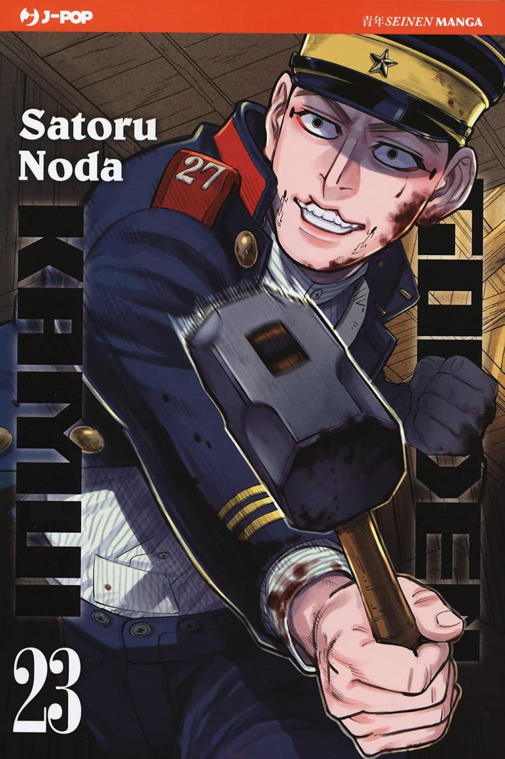 Copertina del manga Golden Kamui Vol. 23; il personaggio Usami Tokishige, in divisa militare e con piccoli disegni sulle guance, sorride follemente mentre sferra un colpo con un grosso martello di legno.