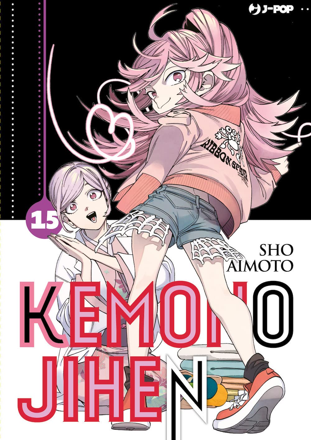 Copertina del quindicesimo volume del manga 'Kemono Jihen' di Sho Aimoto, edito da J-POP Manga. L'illustrazione ritrae in primo piano una ragazza dai lunghi capelli rosa sorridente con giacca rosa e pantaloncini di jeans, affiancata da un personaggio dai capelli lilla in abito bianco, sormontati dal numero 15 in un cerchio viola a sinistra e dal titolo 'KEMONO JIHEN' in basso.