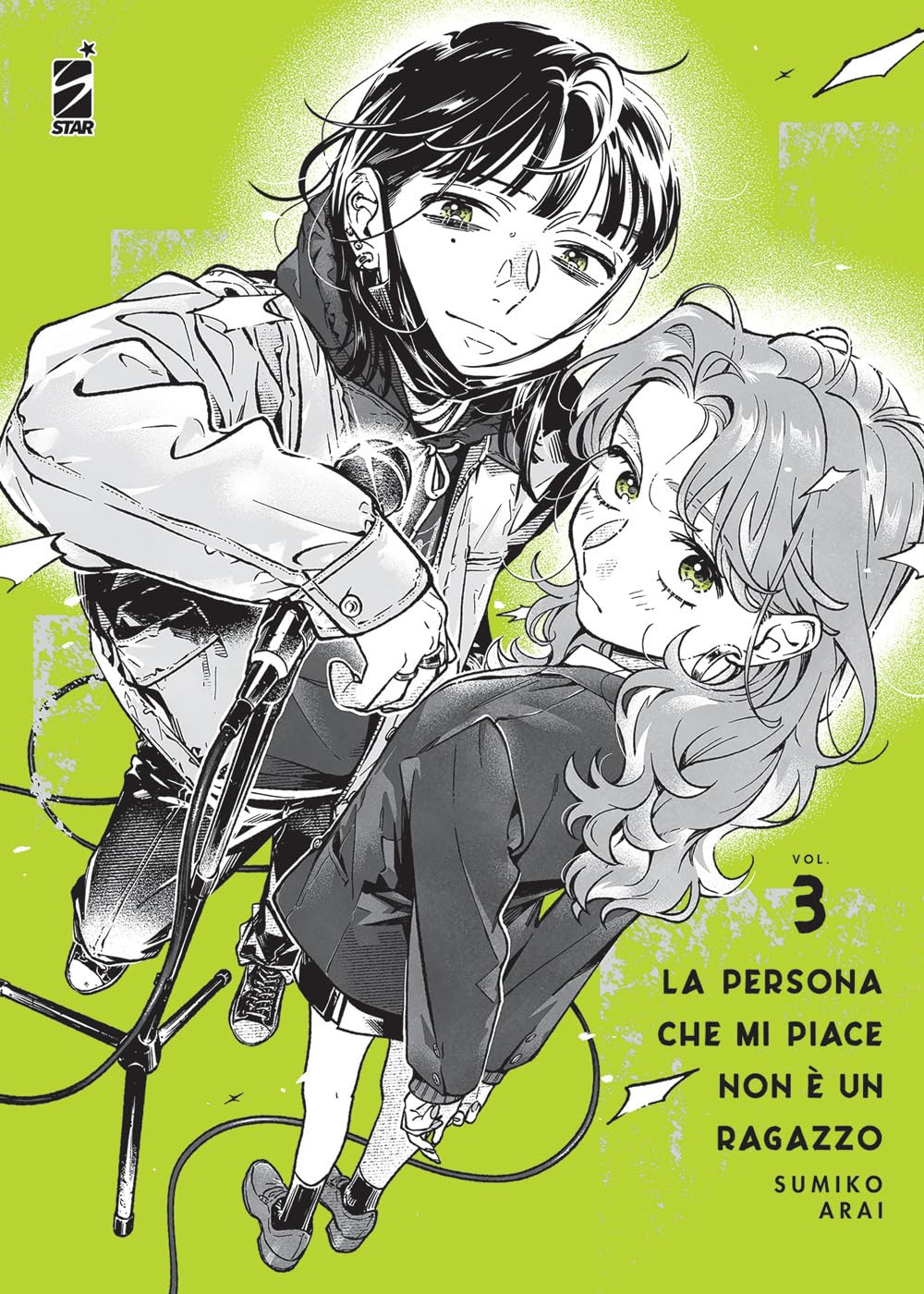 Copertina del manga "La Persona Che Mi Piace Non È Un Ragazzo" volume 3 su sfondo verde lime; Mitsuki, vestita con felpa e stile rock, regge un'asta microfonica mentre Aya la osserva intensamente dal basso.