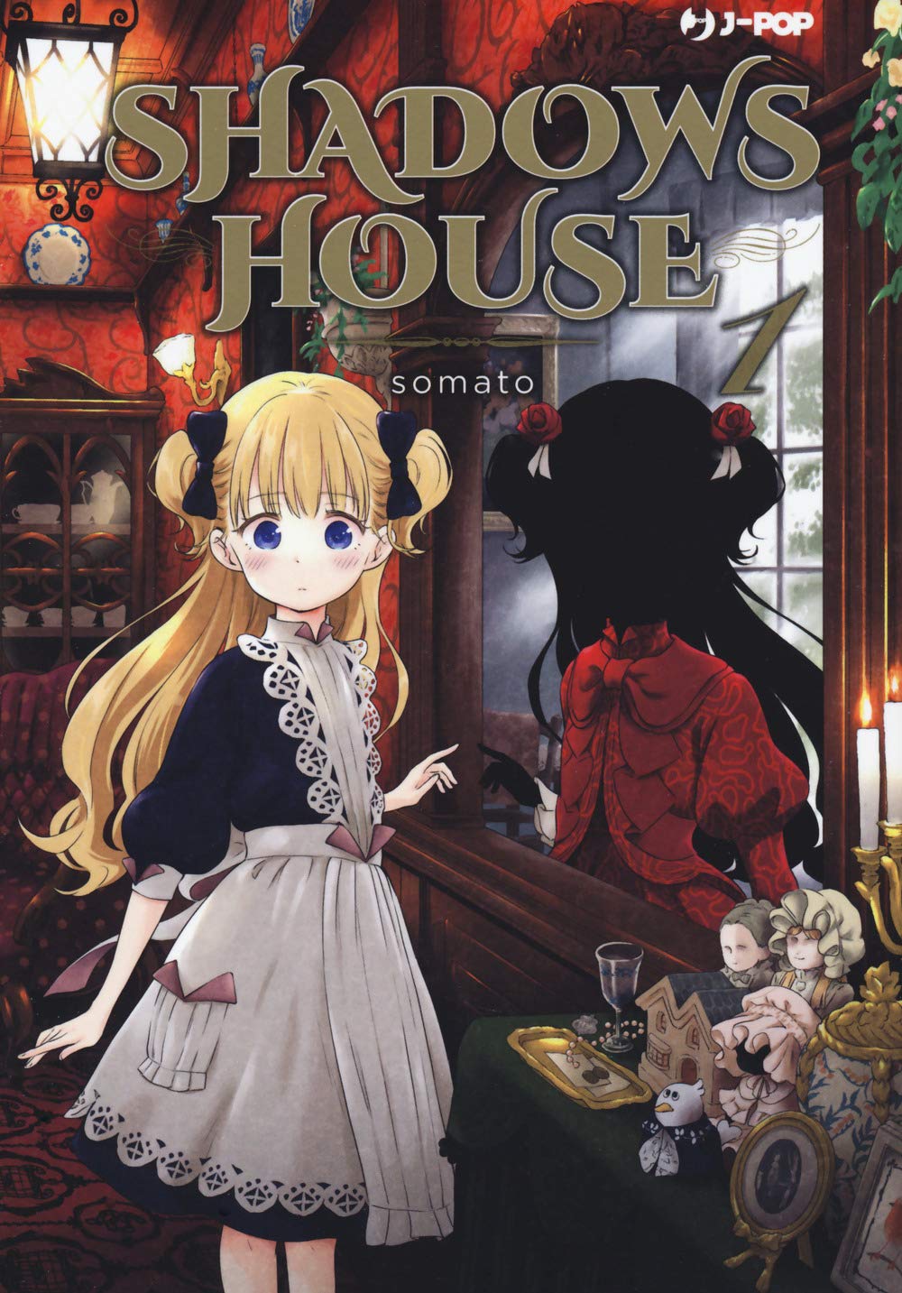 Copertina del manga Shadows House Vol. 1 edito da J-Pop. In primo piano la bambola vivente Emilico, una bambina dai capelli biondi e occhi azzurri in uniforme da cameriera. Accanto a lei si staglia l'ombra di Kate, una silhouette completamente nera che indossa un elegante abito rosso vittoriano. L'ambientazione è una stanza aristocratica ricca di dettagli gotici.