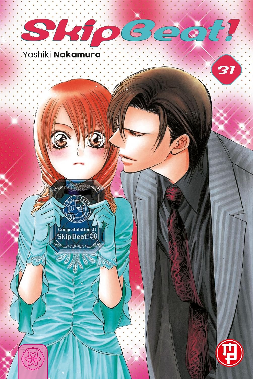 Copertina del volume 31 di Skip Beat! edito da Magic Press con Kyoko in abito azzurro e Ren che le si avvicina al volto.