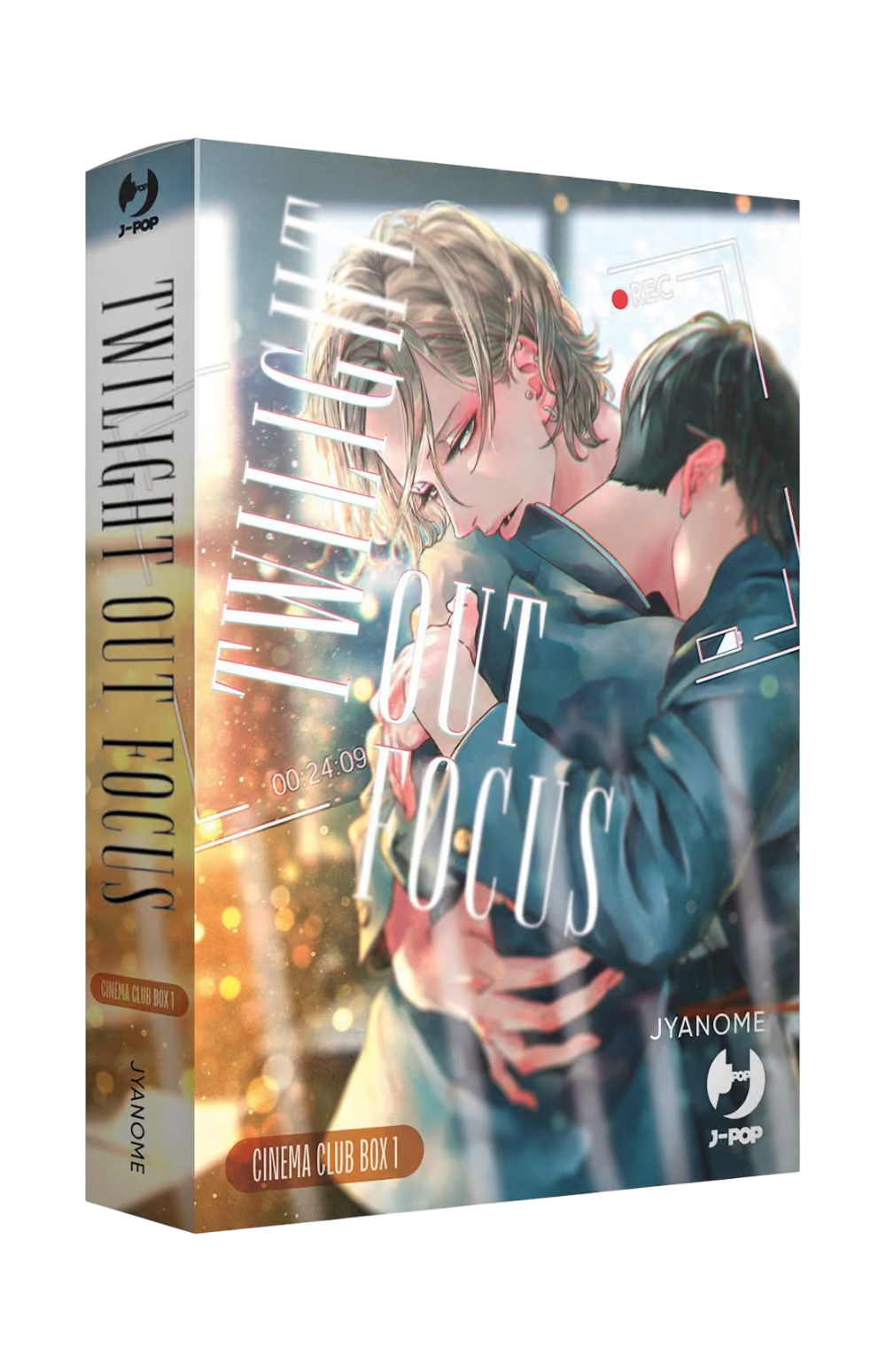 Cofanetto da collezione del manga Boys' Love 'Twilight Out Focus Box 1' di Jyanome, edito da J-POP Manga. L'illustrazione sul box ritrae due studenti abbracciati in un momento intimo con l'effetto grafico dell'interfaccia di una videocamera in registrazione.