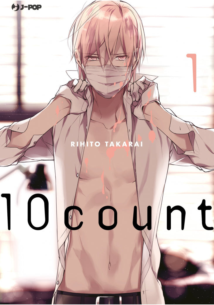 Copertina del manga 10 Count volume 1. Un affascinante ragazzo dai capelli chiari indossa una mascherina sul viso e guanti bianchi. Con le mani afferra il colletto della sua camicia bianca lasciandola sbottonata sul petto nudo, mentre alcune delicate macchie rosa simili a petali cadono intorno a lui. Il titolo dell'opera "10 count" campeggia in grande a metà copertina.