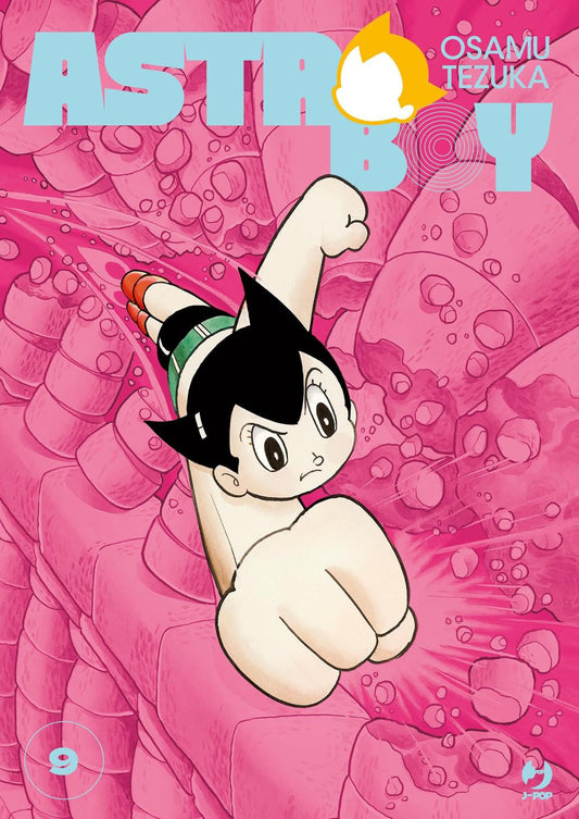 Copertina del manga Astro Boy Osamushi Collection Vol. 9 edito da J-POP. Un'illustrazione dinamica mostra Astro Boy, il celebre ragazzino robotico con i caratteristici capelli scuri a punta e stivaletti rossi, che vola a gran velocità verso l'osservatore con il pugno destro proteso in avanti. Lo sfondo è interamente sui toni del rosa acceso, caratterizzato da una complessa struttura che ricorda elementi organici e meccanici crivellati di buchi e crateri. In alto domina il grande titolo "ASTRO BOY" a grosse 