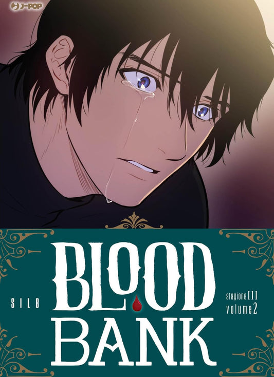 Copertina del fumetto Blood Bank Stagione III volume 2. In primo piano il volto sofferente e in lacrime di un ragazzo con i capelli neri disordinati e intensi occhi azzurri. Nella metà inferiore campeggia un elegante riquadro verde scuro con decorazioni dorate, che fa da sfondo al titolo "BLOOD BANK" in bianco, con una singola goccia di sangue rossa.