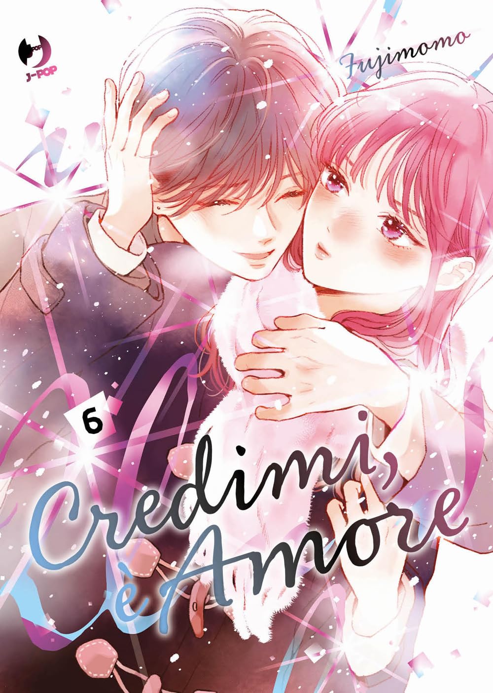Copertina del sesto volume del manga Credimi, è Amore. Un ragazzo e una ragazza si abbracciano teneramente su uno sfondo luminoso dai toni rosa e violacei.