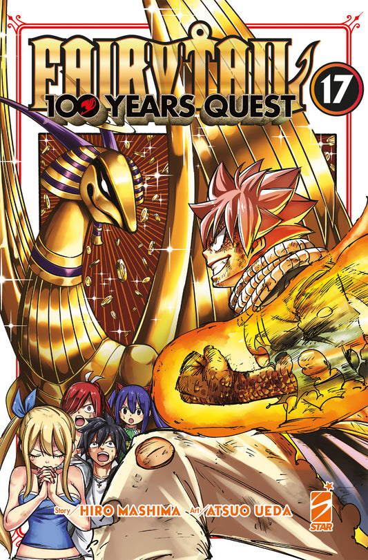 Copertina del diciassettesimo volume in italiano del manga 'Fairy Tail 100 Year Quest' di Hiro Mashima e Atsuo Ueda, edito da Star Comics. L'illustrazione ritrae a destra Natsu Dragneel con il pugno avvolto dalle fiamme pronto a combattere di fronte all'imponente Drago Divino dell'Oro Viernes a sinistra, caratterizzato da un'armatura dorata in stile egizio, con in basso a sinistra Lucy, Gray, Erza e Wendy spaventati, sormontati dal titolo FAIRY TAIL 100 YEARS QUEST in lettere dorate, dal numero 17 in alto a