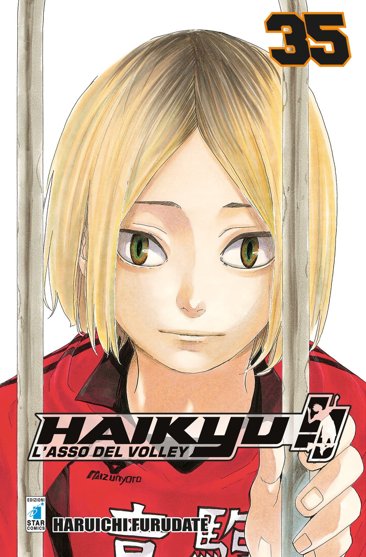 Copertina del manga Haikyu!! Vol. 35 edito da Star Comics. In primissimo piano spicca il volto dell'alzatore del Nekoma, Kenma Kozume, con i suoi caratteristici capelli biondi a caschetto con radici scure e gli occhi felini di colore ambrato. Kenma guarda dritto verso l'osservatore da dietro una grata metallica, che simboleggia la sua natura di stratega e la "trappola" tesa agli avversari. In alto a destra risalta il numero 35.