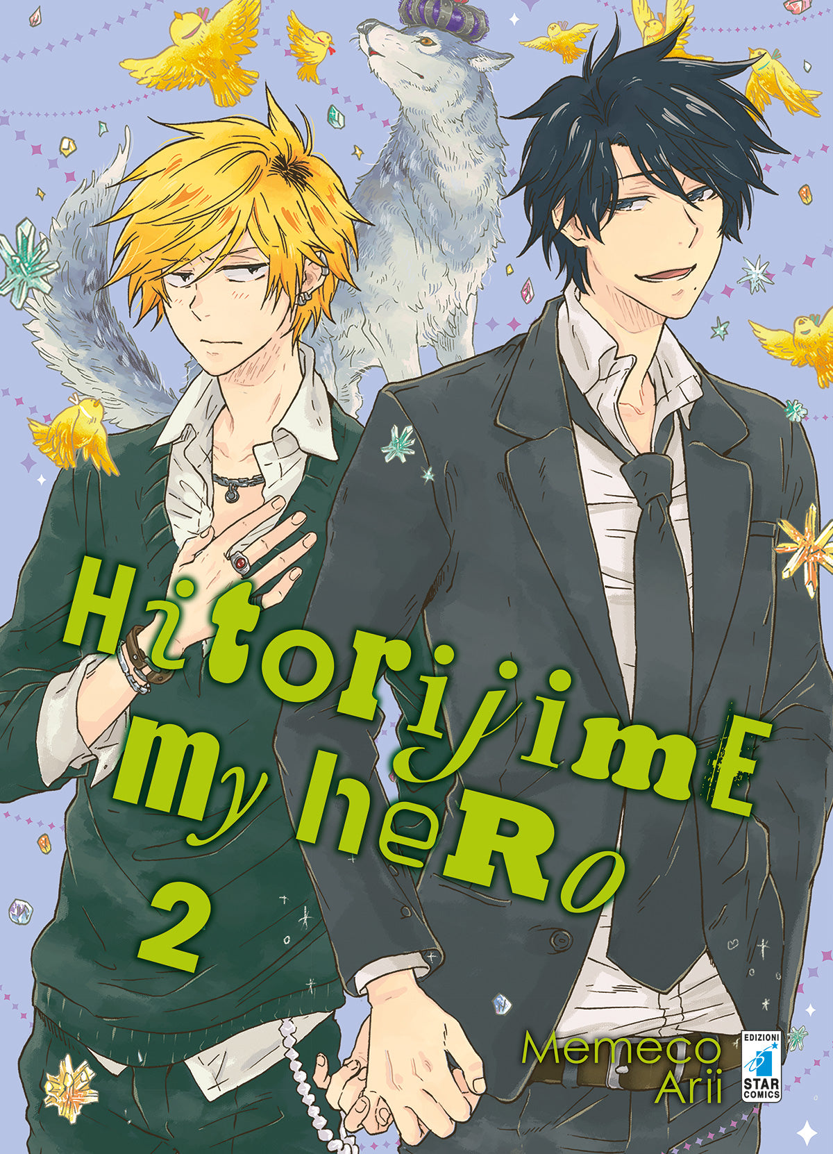 Copertina del secondo volume in italiano del manga Boys' Love 'Hitorijime My Hero' di Memeco Arii, edito da Star Comics. L'illustrazione su uno sfondo lilla decorato con stelline, cristalli, uccellini gialli in volo e un maestoso lupo bianco con corona ritrae lo studente biondo Setagawa in maglione verde con la mano al petto a sinistra, affiancato dal professor Kosuke in giacca scura e cravatta mentre gli sfiora la mano sorridendo a destra, sormontati dal titolo HITORIJIME MY HERO in grandi lettere.