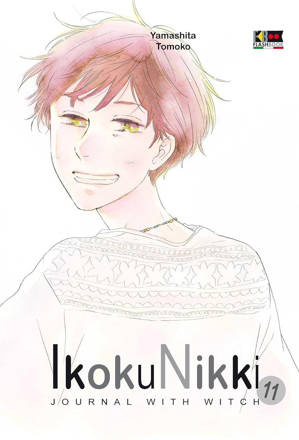 Copertina dell'undicesimo volume del manga Ikoku Nikki - Journal with Witch. Un'illustrazione dal tocco delicato ad acquerello ritrae un personaggio in primo piano con un sorriso sereno e luminoso, dai corti capelli sfumati di castano e rossiccio e gli occhi chiari. Indossa una maglia bianca con delicati motivi decorativi e una sottile collana di perline colorate. In basso campeggia il titolo del manga in caratteri neri e grigi su fondo bianco.