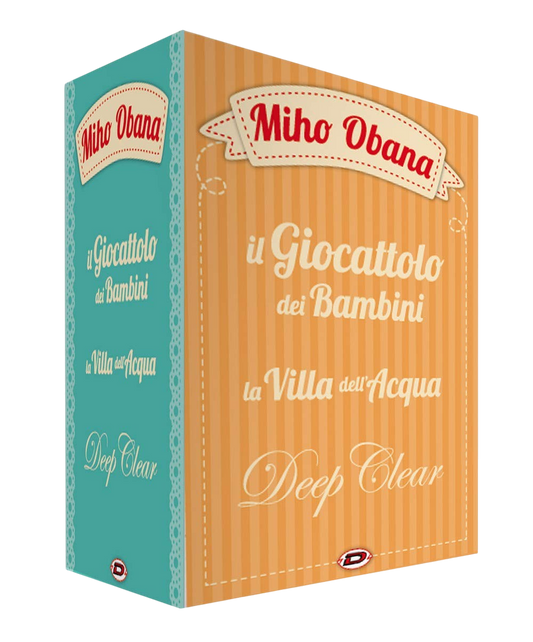Cofanetto da collezione del manga 'Il Giocattolo dei Bambini - Big Edition' (Rossana) di Miho Obana, edito da Dynit Manga. Il box rigido presenta una facciata frontale a righe verticali arancioni e beige e un lato azzurro turchese con ricami laterali bianchi, con riportati in bianco e rosso i titoli 'Miho Obana', 'Il Giocattolo dei Bambini', 'La Villa dell'Acqua' e 'Deep Clear'.
