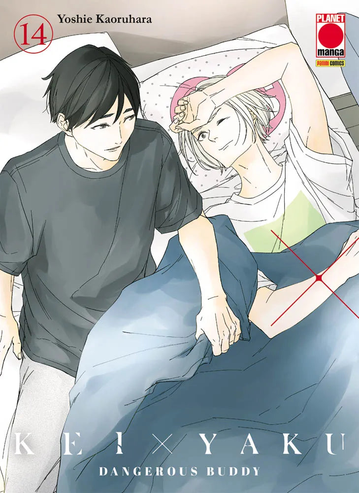 Copertina del quattordicesimo volume in italiano del manga 'Kei X Yaku - Dangerous Buddy' di Yoshie Kaoruhara, edito da Planet Manga. L'illustrazione mostra una scena intima in camera da letto in cui un ragazzo dai capelli scuri vestito con una t-shirt grigia è seduto sul bordo del letto e guarda un altro ragazzo con capelli biondi platino sdraiato sotto una coperta azzurra, sorridente e con il braccio alzato sopra la testa; in alto a sinistra compare il numero 14 in un cerchio rosso e in basso il titolo de