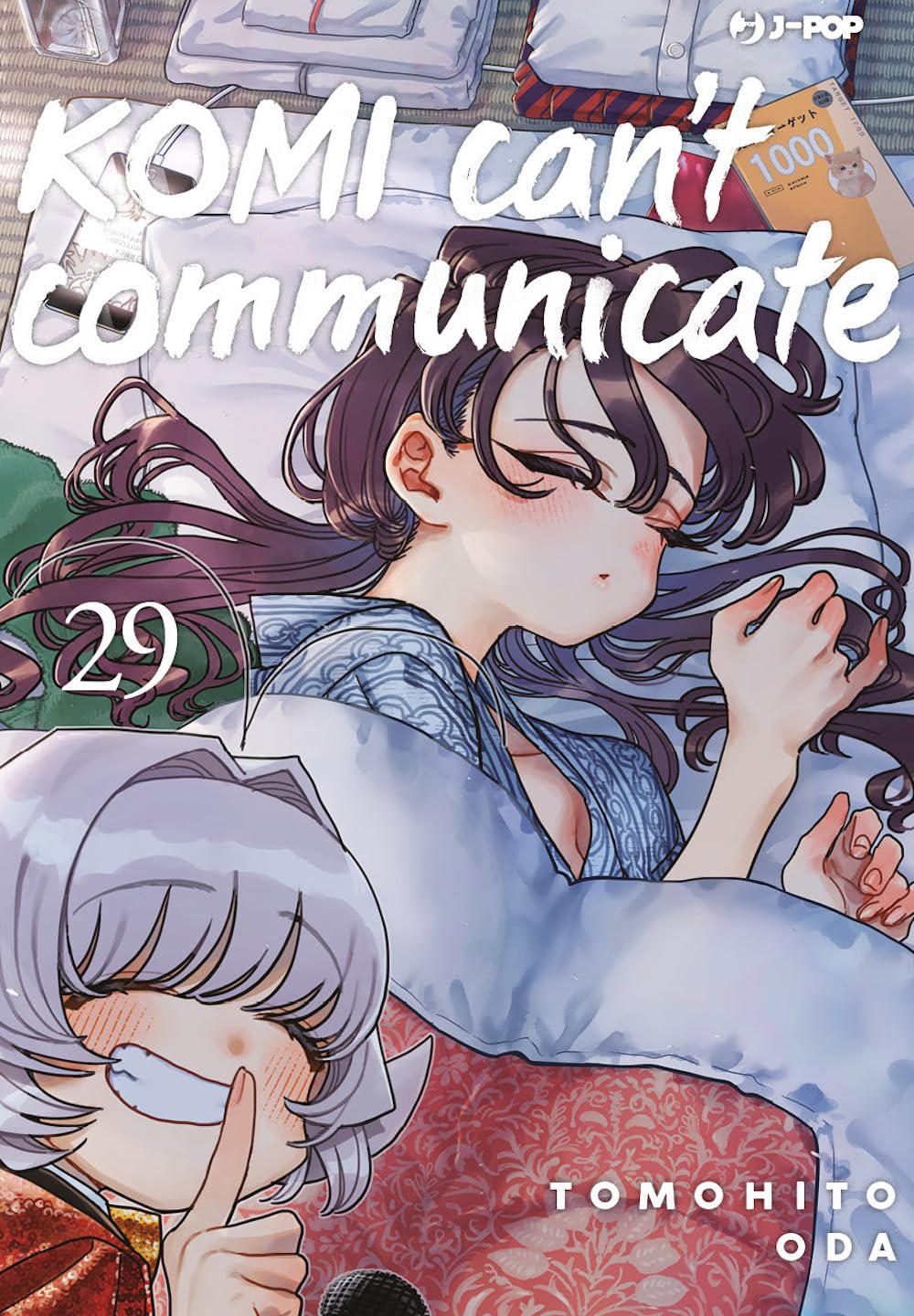 Copertina del ventinovesimo volume del manga 'Komi Can't Communicate' di Tomohito Oda, edito da J-POP Manga. L'illustrazione ritrae Shouko Komi addormentata serenamente sotto le coperte in yukata, con in basso a sinistra un dettaglio di Najimi Osana che sorride maliziosamente facendo il segno del silenzio con il dito sulle labbra, sormontate dal titolo in bianco e dal numero 29 a sinistra.