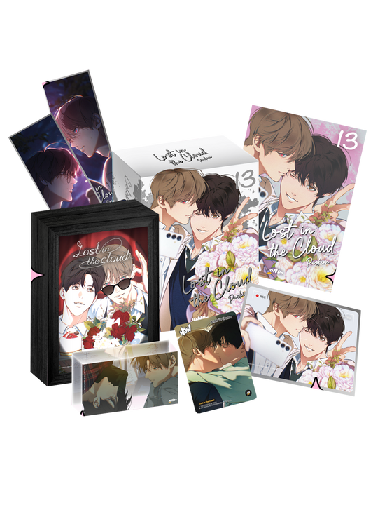 Cofanetto Celebration Edition del manhwa Lost in the Cloud 13. L'immagine mostra il volume, una scatola dedicata, una cornice retroilluminata, un blocco acrilico, stampe e cartoline esclusive con i protagonisti.