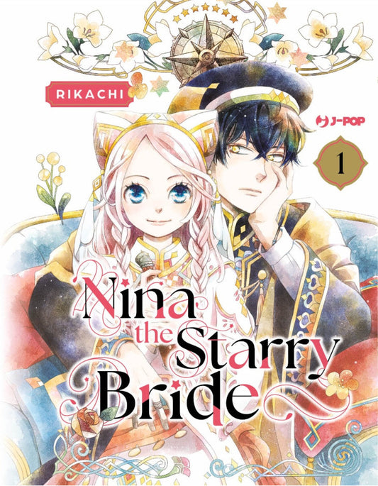 Copertina del manga Nina the Starry Bride Vol. 1 edito da J-POP Manga. L'illustrazione dai delicati toni acquerello mostra in primo piano due personaggi seduti su un divano azzurro con cuscini rossi. La ragazza ha lunghi capelli rosa chiaro mossi raccolti in trecce, grandi occhi azzurri brillanti e indossa un abito bianco decorato con motivi dorati e un cerchietto con orecchie da gatto stilizzate. Dietro di lei, un ragazzo con capelli neri e intensi occhi gialli indossa una divisa militare scura con ricami 