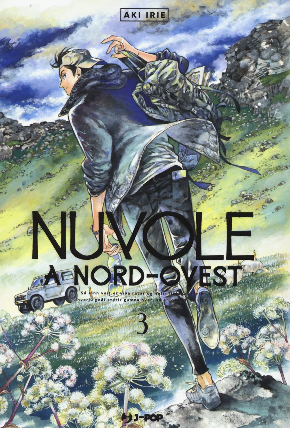 Copertina del manga Nuvole a Nord-Ovest Vol. 3; il protagonista Kei Miyama cammina su un pendio erboso con fiori bianchi, voltandosi indietro. Indossa uno zaino e abiti scuri; sullo sfondo si vede la sua jeep bianca parcheggiata in un paesaggio roccioso.
