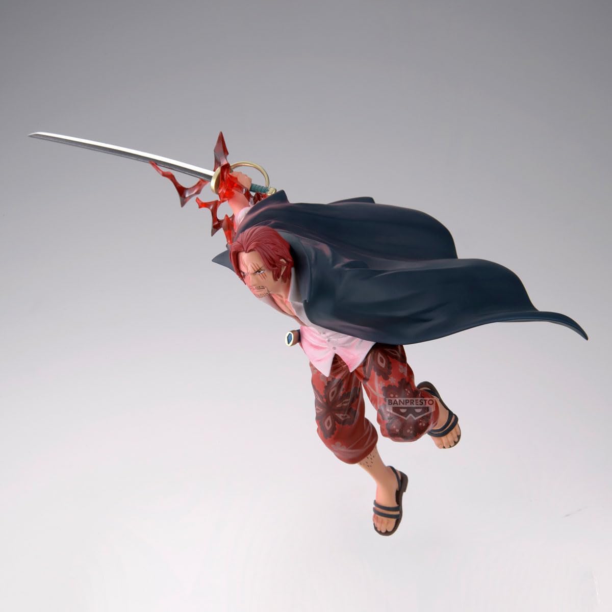 Figure di Luffy di One Piece in versione Gear 5, con capelli e abiti bianchi, in posa dinamica mentre impugna un fulmine su una base di nuvole.