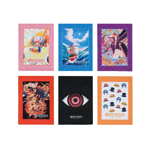 Immagine promozionale di sei mini asciugamani della linea One Piece Card Game di Bandai Ichiban Kuji, disposti su due righe su sfondo nero. Ogni asciugamano presenta una cornice colorata e il logo "ONE PIECE CARD GAME" in basso. Partendo dalla riga in alto, da sinistra a destra: il primo ha un bordo rosa e mostra Chopper seduto tra bolle colorate; il secondo ha un bordo azzurro e raffigura la nave Thousand Sunny in mare aperto.