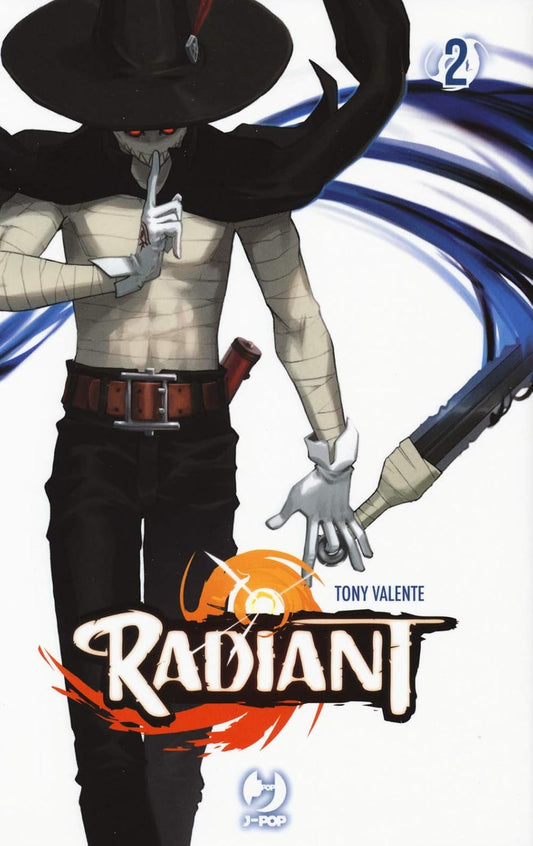 Copertina del secondo volume del manga Radiant. In primo piano un misterioso personaggio bendato, con un mantello scuro e un cappello a tesa larga, che porta il dito indice alla bocca.