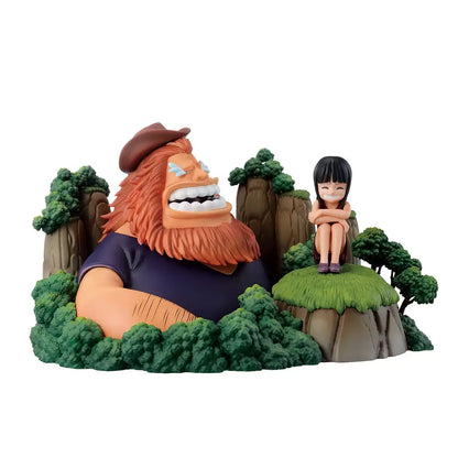 Figura da collezione Ichibansho Dramatic Memories di Robin e Saul tratta da One Piece, come mostrato nel file robin.jpg. Il diorama presenta il gigante Saul con la barba arancione che ride felice tra cespugli verdi e la piccola Nico Robin bambina seduta su una collinetta di terra e erba.