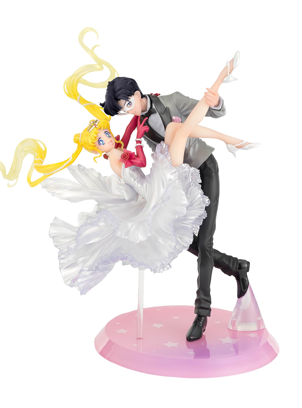 Figura da collezione di Sailor Moon e Tuxedo Mask della linea Figuarts Zero, visibile nel file vera.jpg. I due personaggi sono ritratti in un romantico passo di danza, con Tuxedo Mask in smoking grigio che solleva Sailor Moon, la quale indossa un sontuoso abito bianco fluttuante dalla finitura perlata.