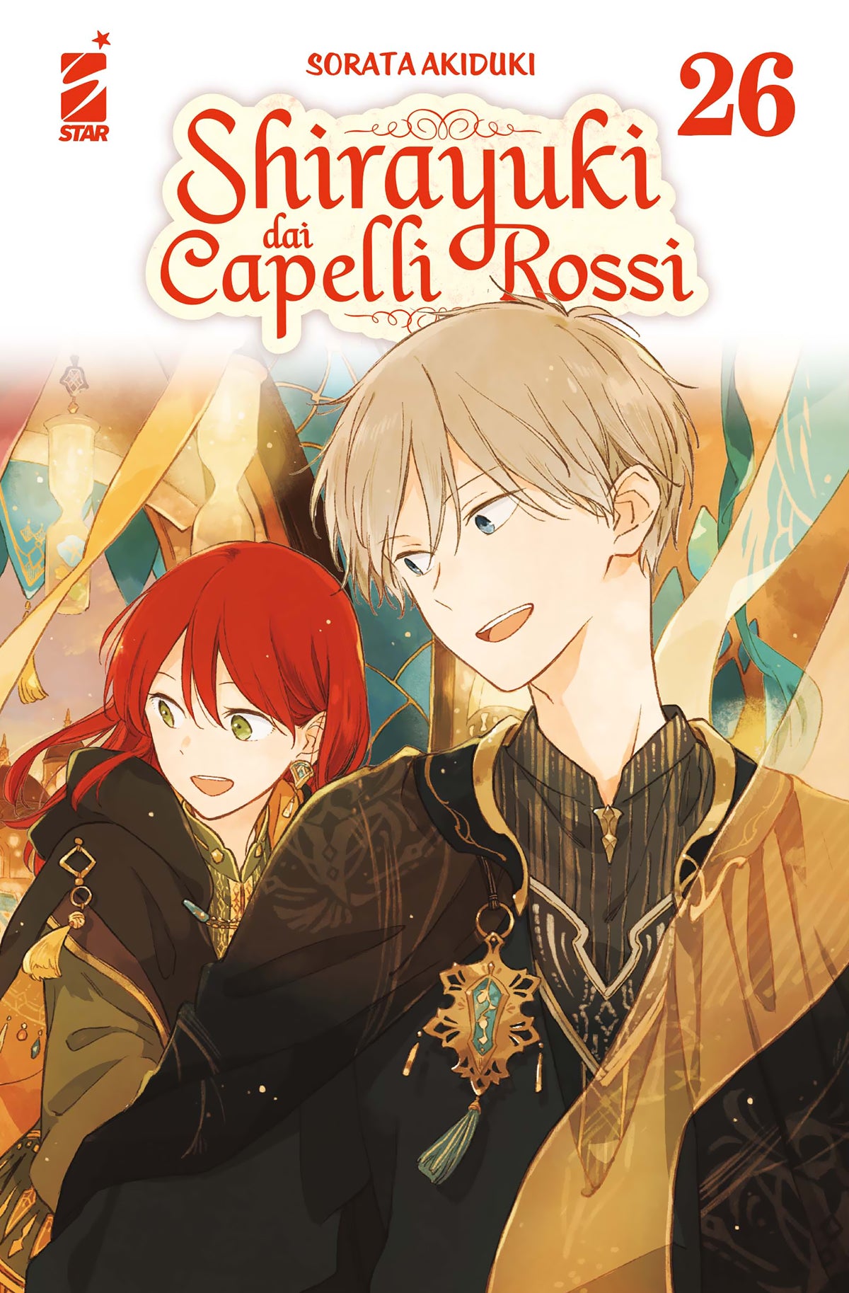 Copertina del ventiseiesimo volume del manga 'Shirayuki dai Capelli Rossi' di Sorata Akiduki, edito da Star Comics. L'illustrazione ritrae in primo piano la protagonista Shirayuki dai capelli rossi che sorride accanto a Zen dai capelli biondi, entrambi vestiti con eleganti mantelli scuri decorati in stile fantasy, sormontati dal titolo in rosso e dal numero 26 in alto a destra.