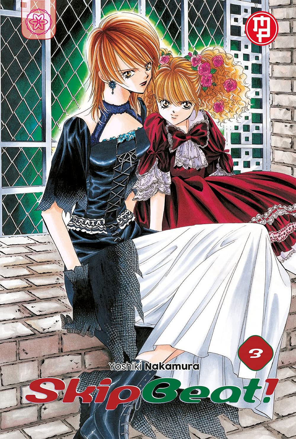 Copertina del terzo volume del manga 'Skip Beat!' di Yoshiki Nakamura, edito da Magic Press. L'illustrazione ritrae Kyoko Mogami in abito scuro da sera affiancata dalla piccola Maria in vestito rosso con boccoli biondi, affiancate dal numero 3 in basso.