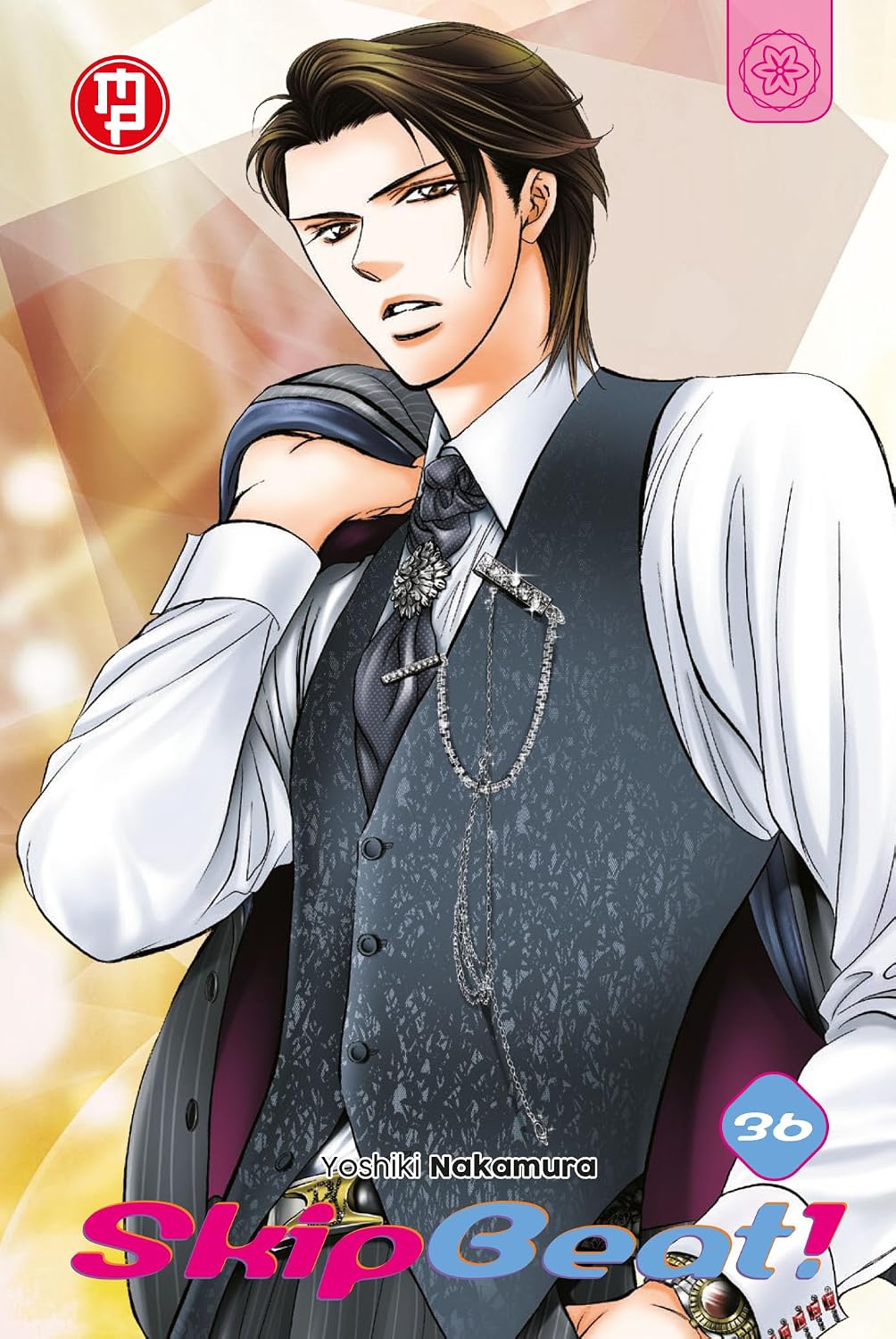 Copertina del trentaseiesimo volume del manga 'Skip Beat!' di Yoshiki Nakamura, edito da Magic Press. L'illustrazione ritrae Ren Tsuruga in gilet elegante con una giacca sulla spalla, affiancato dal numero 36 e dal titolo in basso.