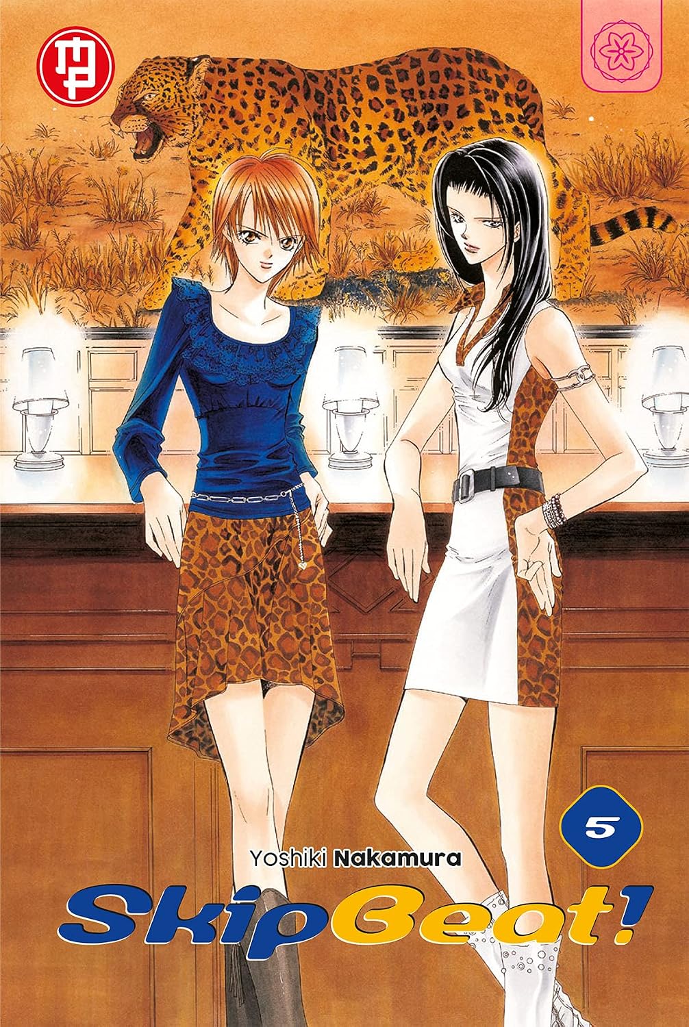 Copertina del quinto volume del manga 'Skip Beat!' di Yoshiki Nakamura, edito da Magic Press. L'illustrazione ritrae Kyoko Mogami e Kanae Kotonami con abiti maculati su uno sfondo raffigurante un leopardo, affiancate dal numero 5 in basso.