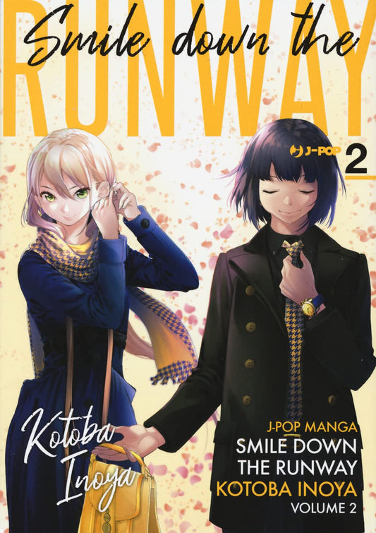 Copertina del secondo volume in italiano del manga 'Smile Down The Runway' di Kotoba Inoya, edito da J-POP Manga. L'illustrazione su uno sfondo chiaro punteggiato da petali rosa mostra a sinistra la modella Chiyuki con cappotto blu e sciarpa che si sistema un orecchino, e a destra lo stilista Ikuto in abito scuro con cravatta a quadri mentre tiene una borsa gialla, con il titolo 'Smile down the RUNWAY' in giallo e il numero 2 in alto a destra.