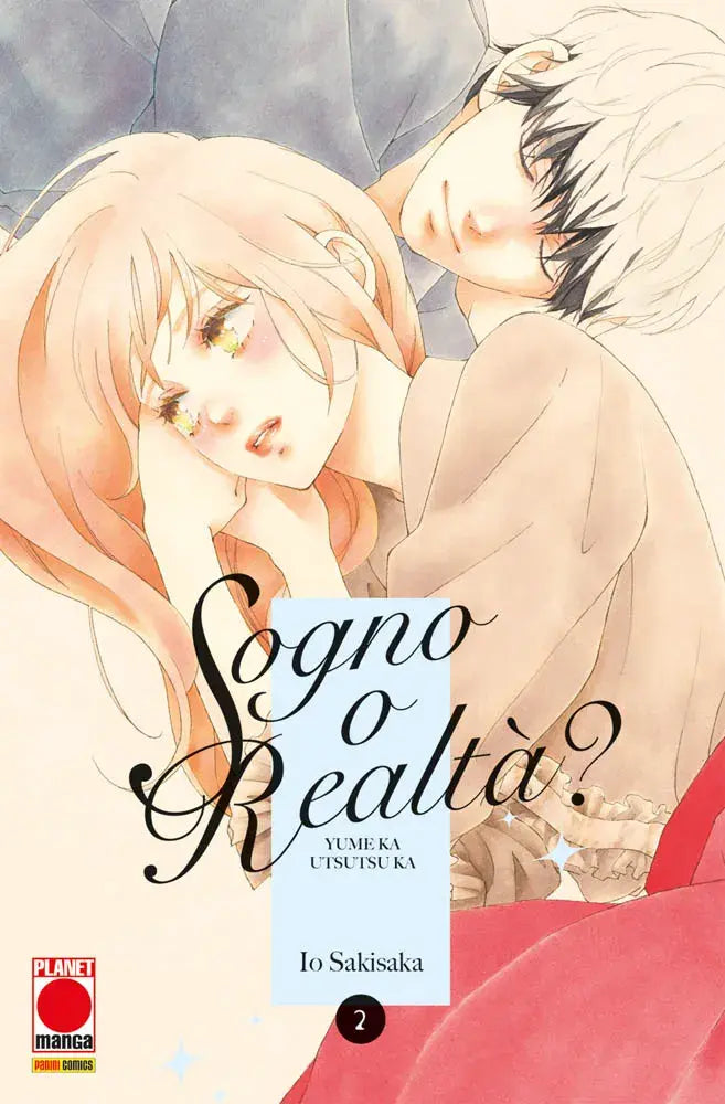 Copertina del manga Sogno o Realtà volume 2. Un'illustrazione delicata mostra due ragazzi distesi vicini, con colori caldi e uno stile acquerello sfumato.