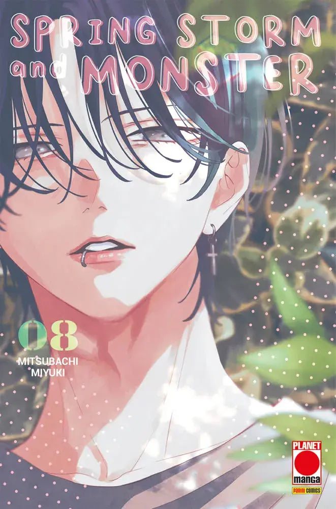 Copertina del manga Spring Storm and Monster volume 8. In primo piano il volto di un ragazzo con capelli scuri, occhi chiari e un piccolo piercing al labbro.