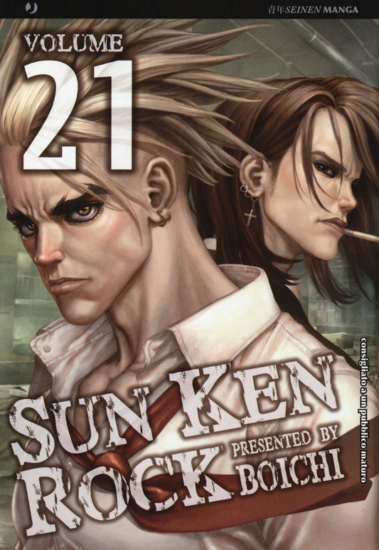 Copertina del manga Sun Ken Rock Vol. 21; Ken Kitano in camicia bianca e cravatta rossa sciolta è in primo piano con sguardo malinconico, stando schiena contro schiena con Tae Su che fuma una sigaretta.