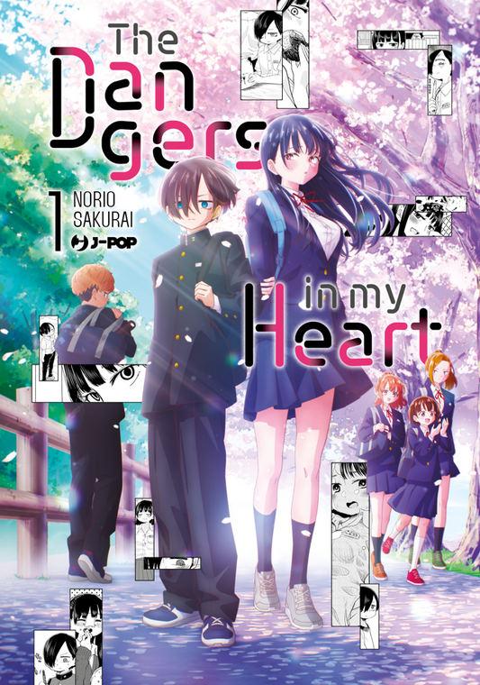 Copertina del manga The Dangers In My Heart Vol. 1, edizione Anime Variant, edito da J-POP. L'illustrazione principale mostra i due protagonisti in uniforme scolastica: il cupo Kyotaro Ichikawa a sinistra e la bellissima Anna Yamada a destra, illuminati dai raggi del sole sotto una pioggia di petali di ciliegio rosa. Intorno a loro, sovrapposte allo sfondo luminoso, fluttuano diverse vignette del manga in bianco e nero. Sullo sfondo a destra si intravedono alcune compagne di classe che camminano sorridenti 