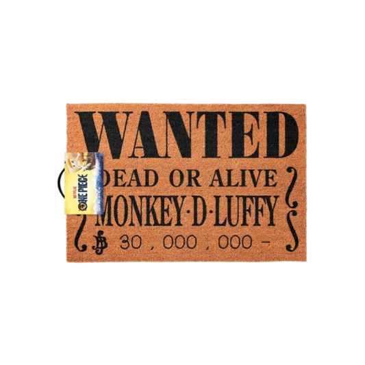 Zerbino rettangolare in fibra color marrone chiaro a tema One Piece, fotografato dall'alto su sfondo bianco. Il design riproduce un avviso di taglia pirata stampato in nero. Dall'alto verso il basso si leggono le scritte: "WANTED", "DEAD OR ALIVE", "MONKEY·D·LUFFY" e infine l'importo della taglia, "30,000,000", preceduto dal simbolo dei Berry (la moneta del mondo di One Piece). Ai lati del testo sono presenti delle parentesi graffe decorative in stile western.